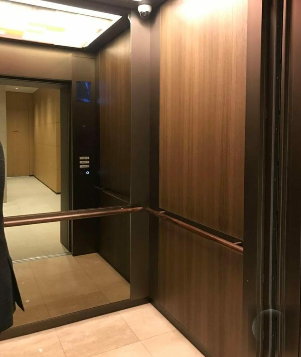 Walnut-panel passenger cabin — recent handover